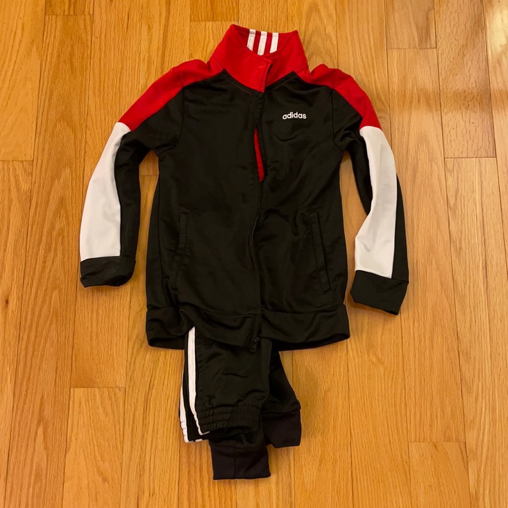 Adidas track suit. Boys size 7